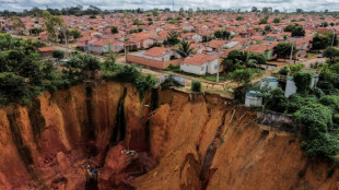 In Brazil, a damaged city lives on edge of abyss