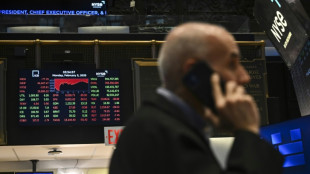 Wall Street ouvre en baisse, entre résultats d'entreprises et tensions commerciales