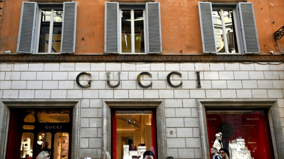 Gucci owner Kering's annual profit plunges