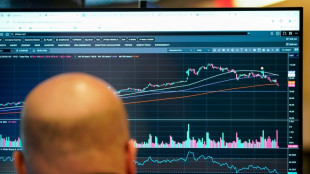 Wall Street en net recul, entre résultats et guerre commerciale