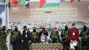 Flanked by masked gunmen, Israeli hostages address Gazans before release