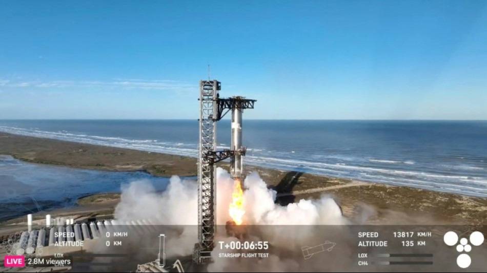 SpaceX catches Starship booster but upper stage explodes