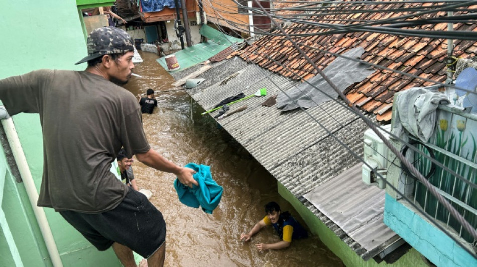 Hundreds evacuated as torrential rains flood Indonesia capital