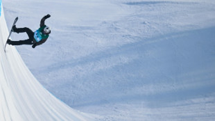 'Messengers of peace' - refugee Asian Games snowboarders fly Afghan flag