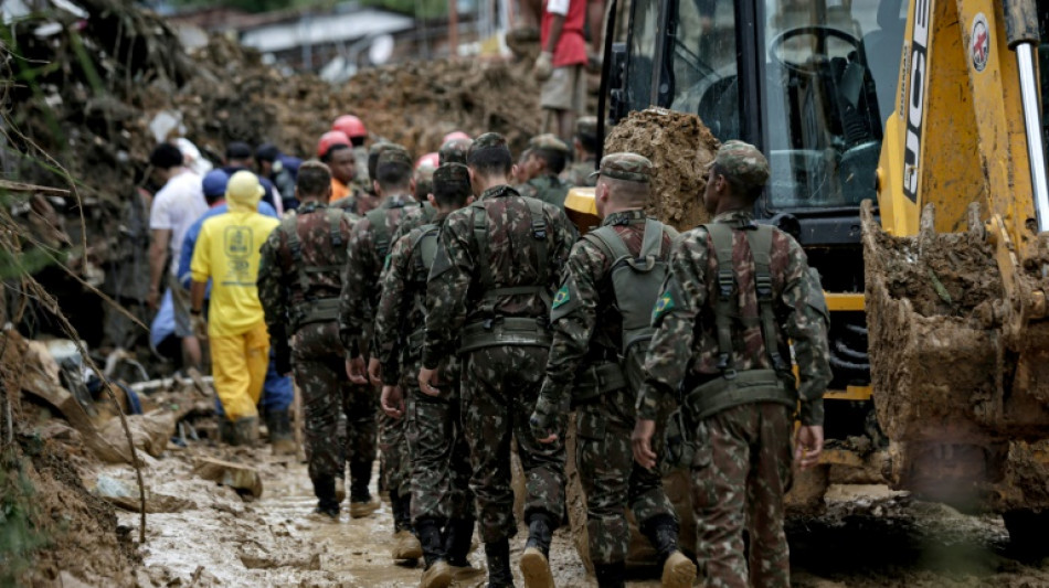 Death toll mounts from Brazil downpours as search continues