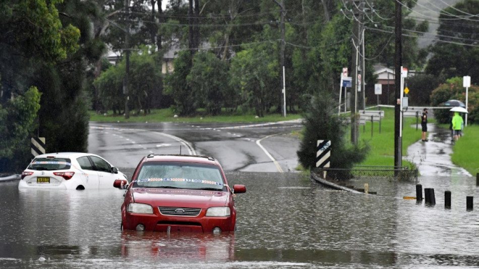 Australia floods force tens of thousands to evacuate