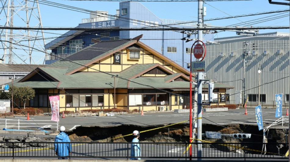 1.2 million in Japan told to use less water to help sinkhole rescue