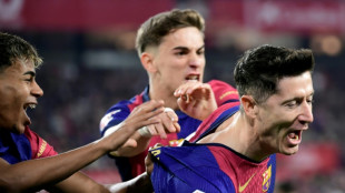 Barca rout Sevilla to maintain title charge