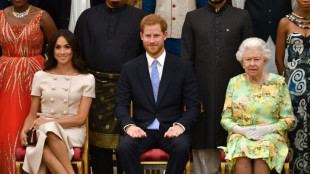 Harry and Meghan keep low profile at queen's Jubilee parade