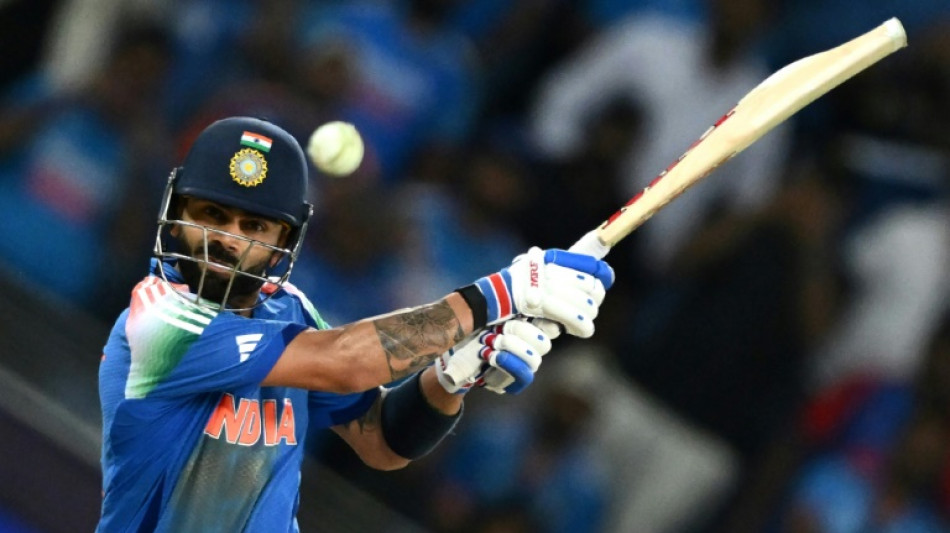 Kohli shuts down 'noise' with landmark century