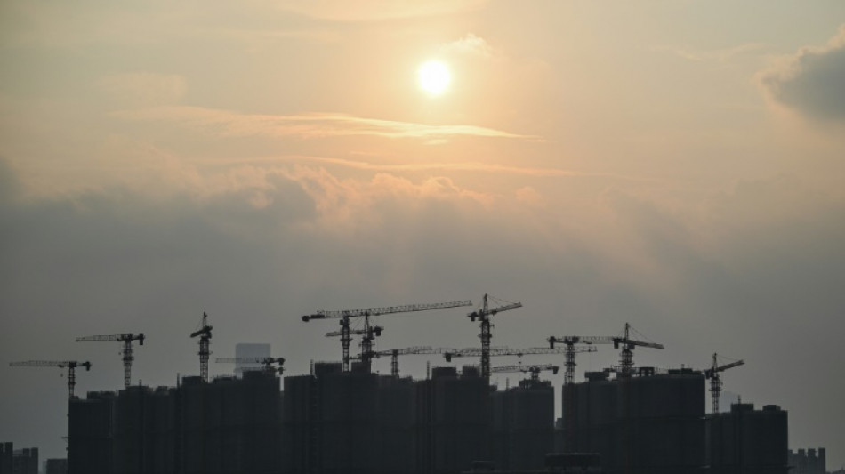 China admits economy facing new 'problems', vows to fix property sector