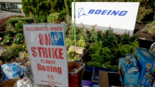 Boeing suspends negotiations with striking workers